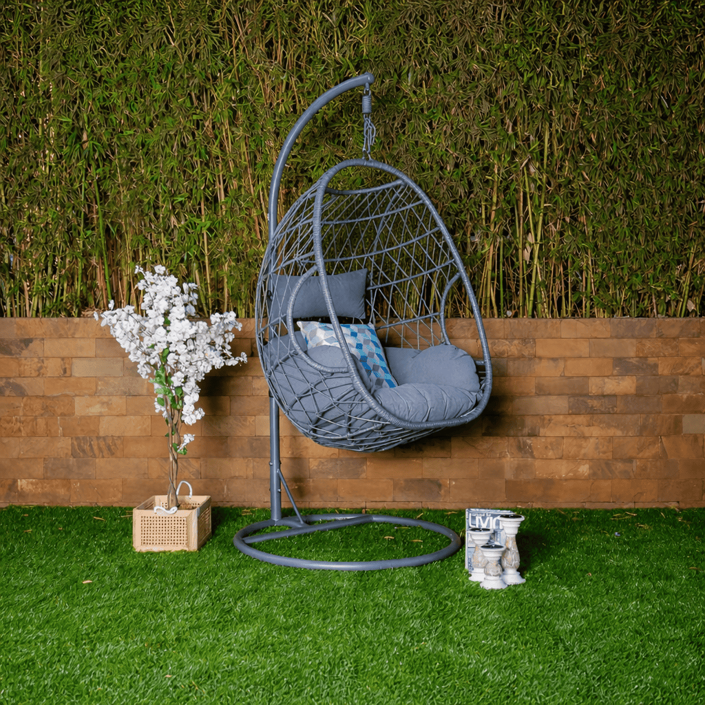 Outdoor hanging egg chair with metal stand and grey cushion